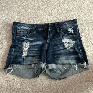 Sneak Peek dark washed denim shorts.